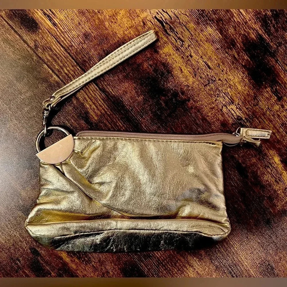 Chateau Handbags - Chateau | ladies metallic gold wristlet.